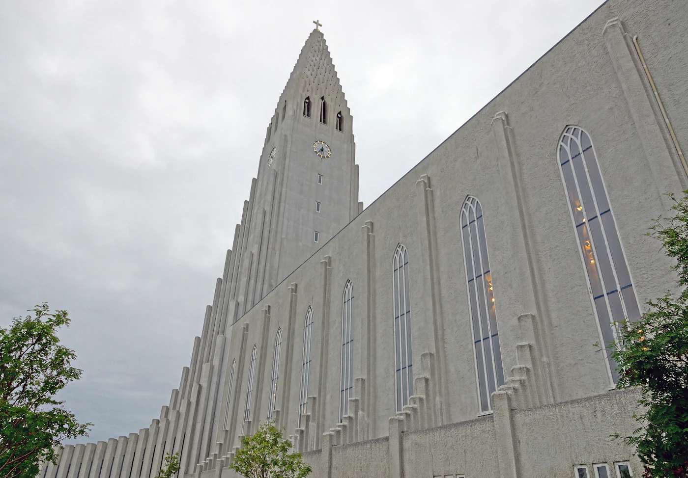 The side of Hallgrímskirkja under grey cloud