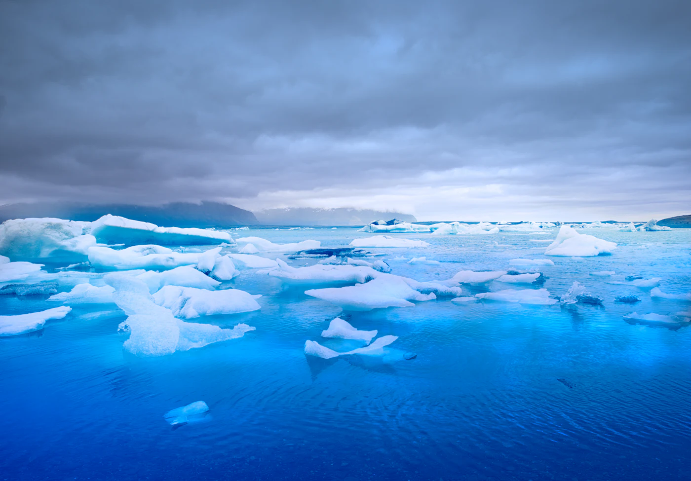 Bright blue ice floating on the lagoon